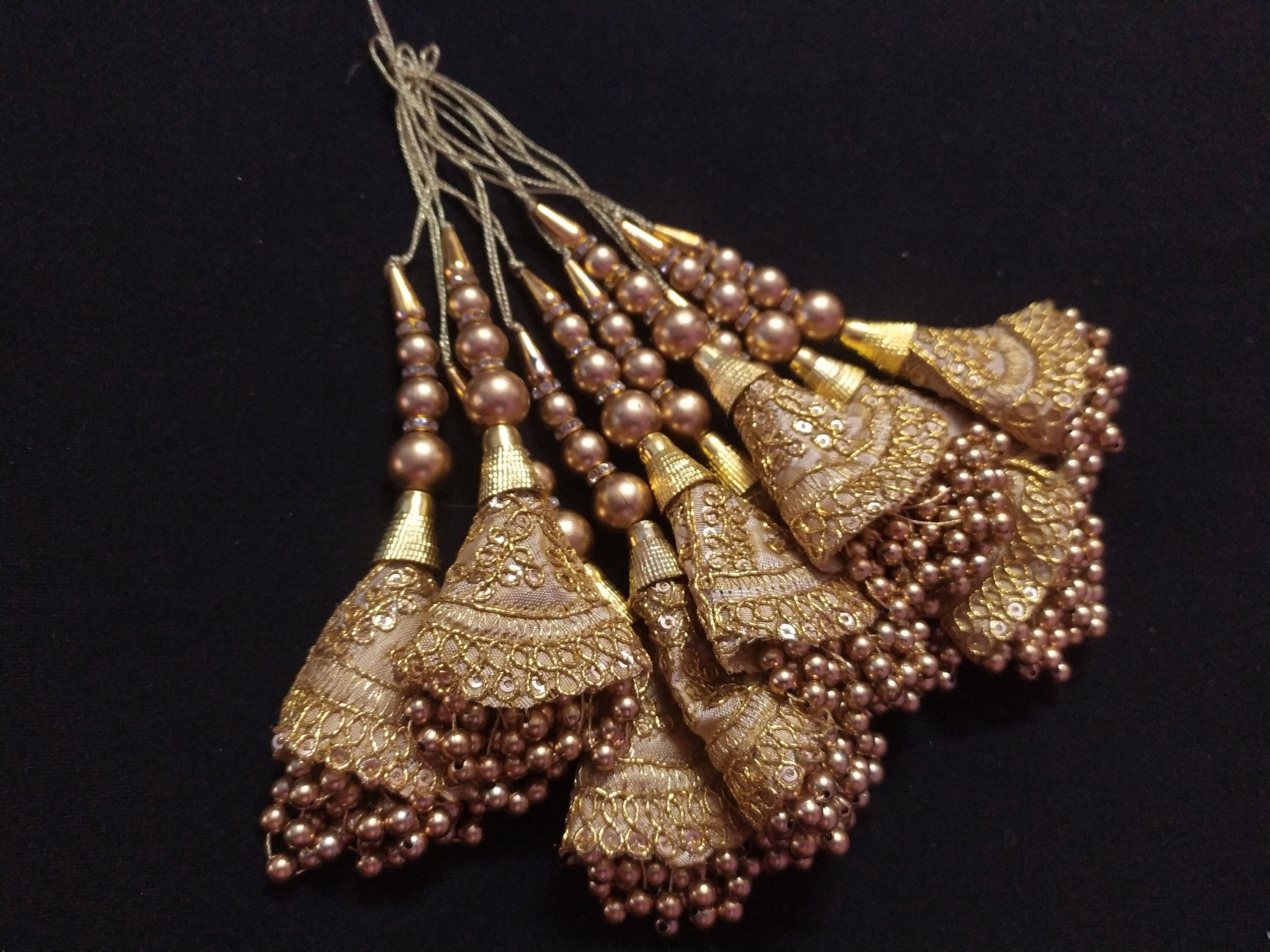 This is Indian Gold and Cream Colour Decorative Handmade Beaded Sequin