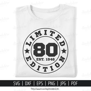 May include: White t-shirt with a black circular design that reads "LIMITED EDITION 80 EST. 1946". The number 80 is in a bold font. The shirt is folded neatly. The bottom of the image shows file type options.