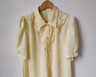 pale yellow blouse