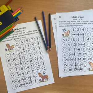 May include: Two black and white worksheets with the title "Math maze" and instructions to help a baby animal find its mother by drawing an arrow through the numbered squares in order from 1 to 16. The first worksheet features a pony and the second worksheet features a cat.