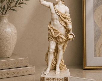 Estátua de Dionísio, deus grego, feita de alabastro e ouro, medindo entre 16 cm e 18 cm.
