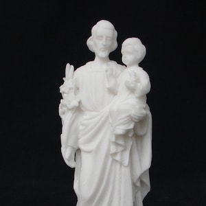 Saint Joseph holding baby Jesus in his hand made of Alabaster 21cm white