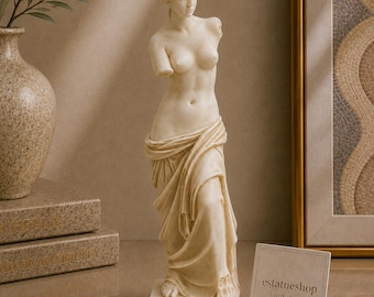 Réplica da estátua da Vênus de Milo em alabastro, 24 cm, com detalhes em ouro.