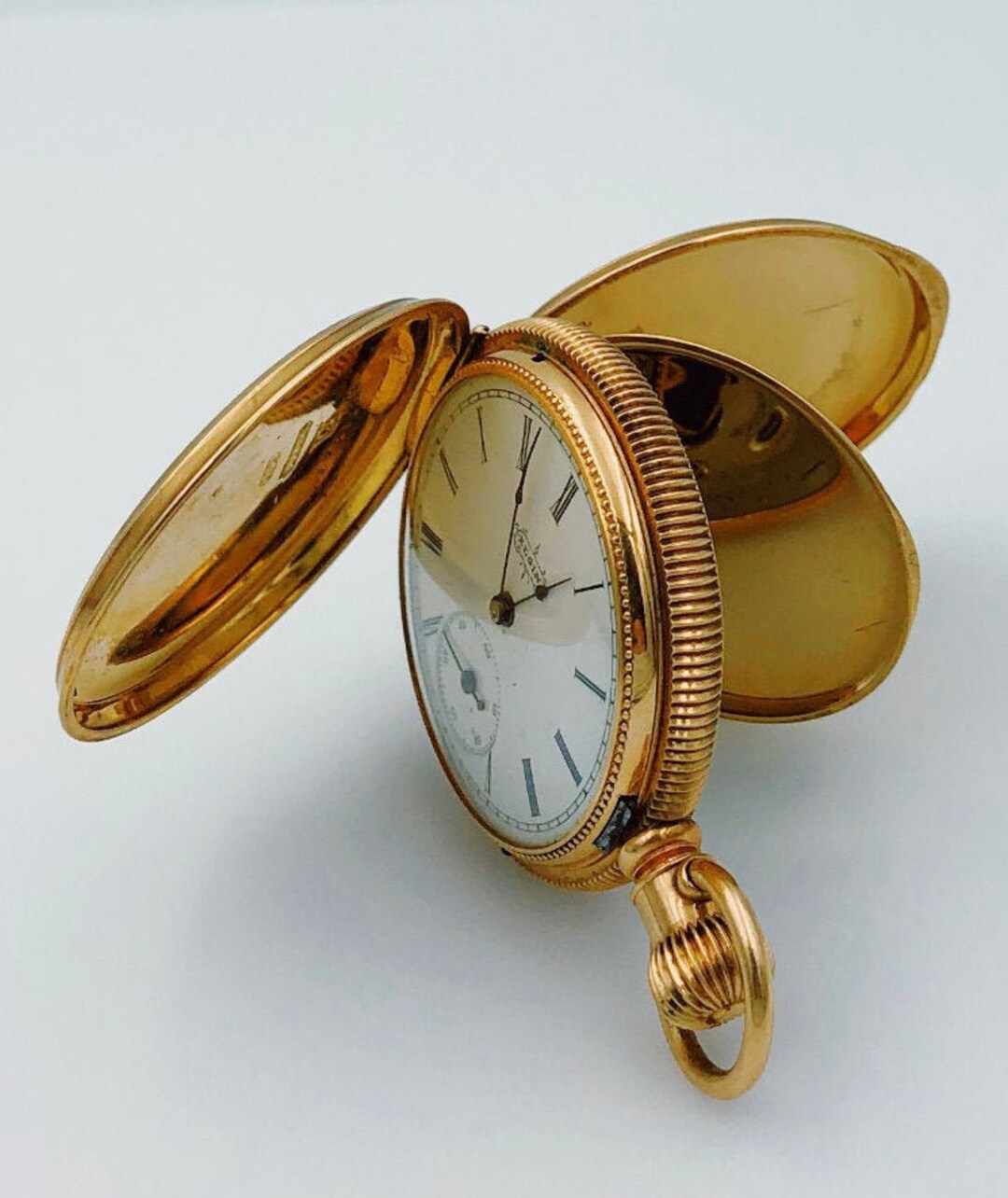 Elgin rose gold pocket watch top