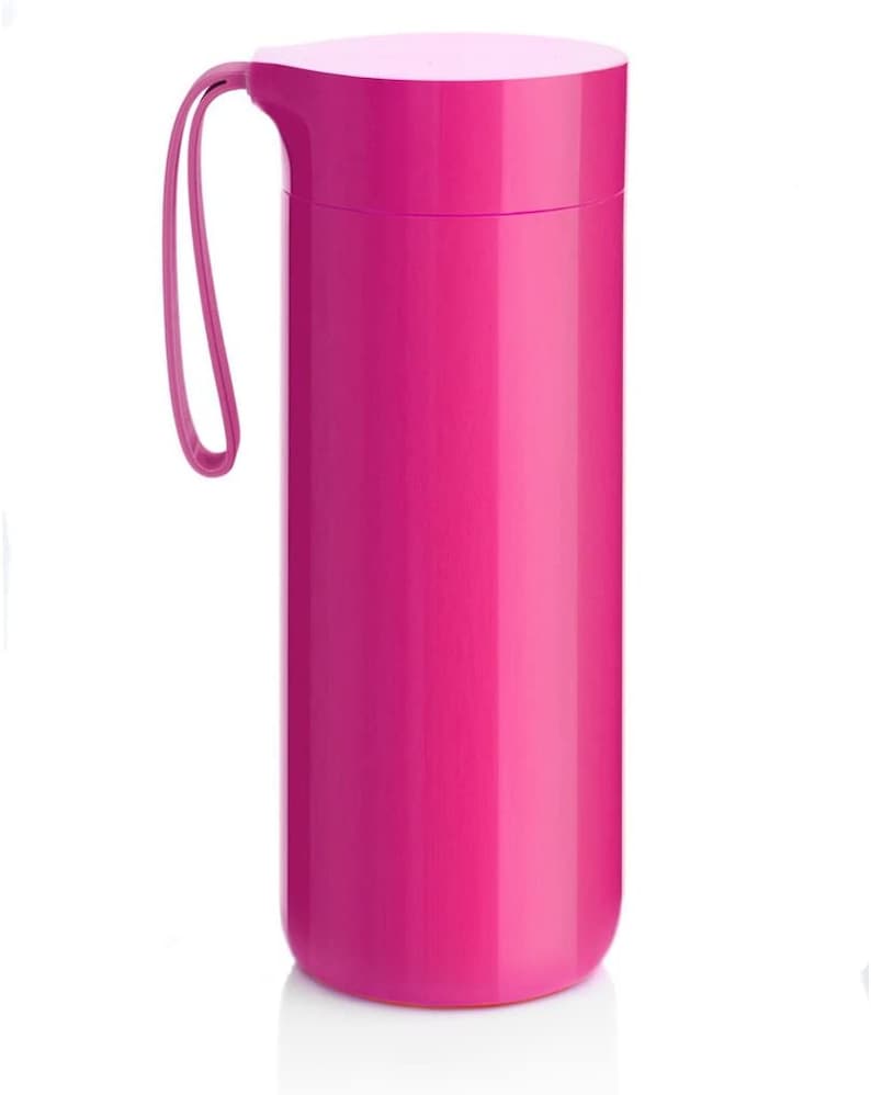 May include: A pink insulated travel mug with a handle. The mug has a smooth, glossy finish.