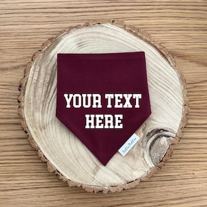 burgundy dog bandana with custom white text for any occasion