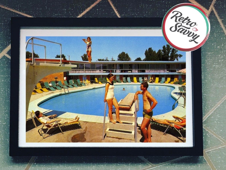 May include: A vintage postcard featuring a swimming pool with people relaxing and swimming. The pool is surrounded by lounge chairs and a motel building. The postcard has a blue sky and green trees in the background.