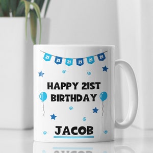 May include: White ceramic mug with a blue and white design. It says "Happy 21st Birthday Jacob" with blue stars and balloons.