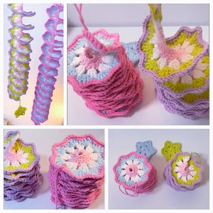 May include: A collection of handmade crochet items in various stages of completion. The pieces include spiral garlands and flower-shaped coasters in shades of pink, blue, yellow, and white. The items are displayed on a white surface.