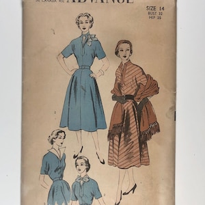 May include: Vintage sewing pattern for a dress, size 14, bust 32 inches, hip 35 inches. The pattern shows four different views of the dress, with a blue dress, a brown and white striped dress, and two variations of a blue dress.