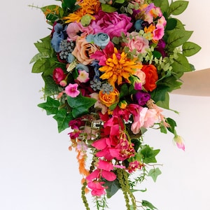 Pink orange bridal bouquet Colorful cascading bouquet Pink wedding Jewel tone wedding Wedding flowers Teal and multicolor flowers