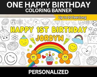 Op de afbeelding: Een zwart-witte kleurbanner met een regenboog, bloemen en smileygezichten. De banner zegt "Happy 1st Birthday Jordyn" en is tot 3 meter lang.