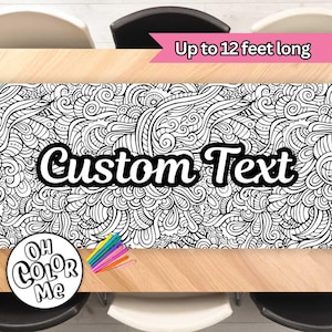 May include: A black and white table runner with a detailed, swirling pattern, featuring the text "Custom Text." The runner is on a wooden table, with the words "Up to 12 feet long" in a pink banner. A logo that says "Oh Color Me" is in the corner.