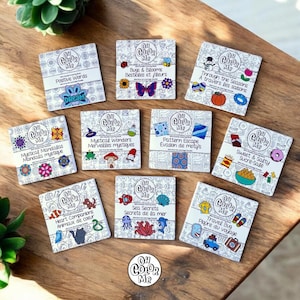 May include: A set of 12 colouring book squares featuring various themes, including positive words, bugs and blooms, mystical wonders, pattern escape, sweet and salty, heart companions, sea secrets, and travel bug. Each square has a black and white illustration and the text "Oh Color Me" in a circle at the bottom.