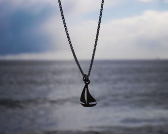 Sterling silver sailing boat necklace