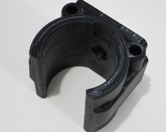May include: A black plastic 3D printed bracket with two holes on the top and one on the side.