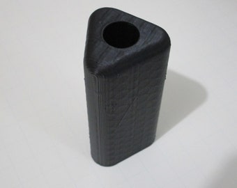 May include: A black triangular-shaped vase with a round opening at the top.