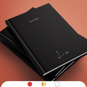 May include: A stack of three black journals with the name "ALEX" printed on the top journal. The top journal has a constellation design in white.