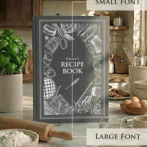 May include: A dark gray hardcover recipe book titled "Emma's Recipe Book" in white text. The cover features white line-art illustrations of various baked goods, bread, and kitchen tools arranged in a decorative border around the central text.