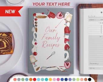May include: A gray recipe book with a white border and red and white illustrations of kitchen tools and baking items. The text "Our Family Recipes" is written in pink cursive lettering on the front cover.