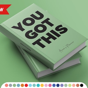 May include: Two sage green hardcover planners stacked on a matching green surface. The top planner has the words "YOU GOT THIS" in large black letters. The text "Anna's Planner" and a signature are also visible. A red banner with "NEW" is in the upper left.