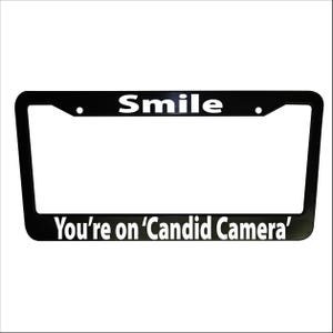 Smile Candid Camera Funny Black Plastic or Aluminum License Plate Frames Truck Car Van Decor Car Accessories Vehicle Parts Holder
