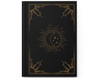 May include: Black notebook cover with a gold crescent moon and stars design. The moon is surrounded by a sunburst pattern. The cover has a gold geometric border.
