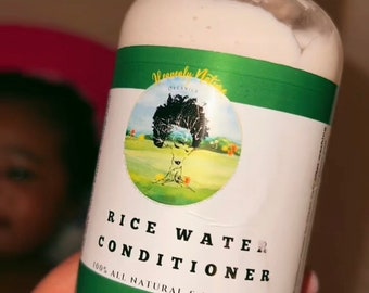 May include: A white bottle of Rice Water Conditioner, held in a hand, with a green and white label. The label includes the text "Rice Water Conditioner" and "100% All Natural & Hand Crafted". The image also includes text about using the conditioner.