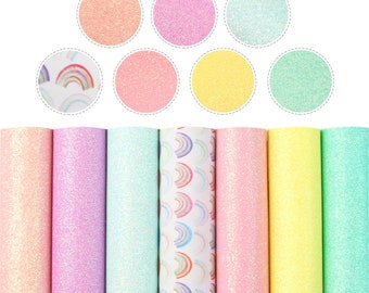 May include: A set of eight rolls of glitter vinyl in various colors, including pink, blue, yellow, and green. The vinyl is perfect for crafting and decorating.