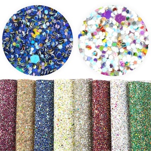 May include: Assortment of eight rolls of glitter fabric in various colors, including burgundy, gold, blue, white, and green. The fabric is covered in small, iridescent glitter.