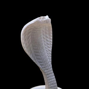 Egyptian Uraeus, ancient Egyptian Cobra snake the goddess of protection in the ancient Egyptian Mythology Handcrafted cobra statues in Egypt