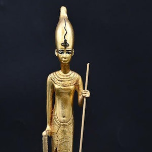 Rare, handcrafted items from museums, ancient Egyptian relics, and a replica of Tutankhamun as a young Egyptian king Replica