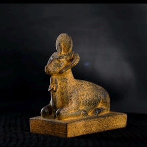 Rare statue of the god Khnum, the ram, the god of flood and goodness in Egyptian mythology. Egyptian sculptures, museum copy, made in Egypt
