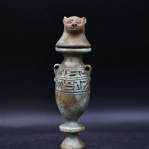 Sekhmet Vase: Egyptian Revival Urn with Lioness Lid