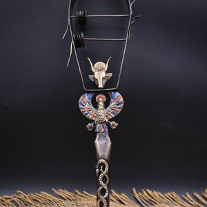 Egyptian mythology and religion feature a unique Sistrum of Hathor, the goddess of beauty and love, Musical Instruments, Historical Music BC