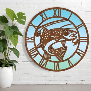 May include: A wooden clock with a blue and green gradient background. The clock face features a fish jumping out of the water with a fishing lure in its mouth. The clock face has Roman numerals.