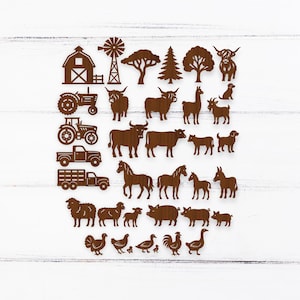 Könnte beinhalten: Eine Sammlung brauner Holz-Ausschnitte zum Thema Bauernhof. Enthält eine Scheune, eine Windmühle, Bäume, verschiedene Nutztiere, Traktoren und Lastwagen. Perfekt für Bastel- oder Dekorationsprojekte.