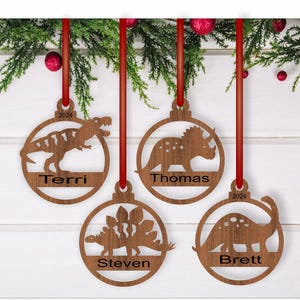 Enfeites de Natal de dinossauros, 4 designs SVG cortados a laser, download instantâneo de modelos em PDF, Dxf, Ai e Cdr.