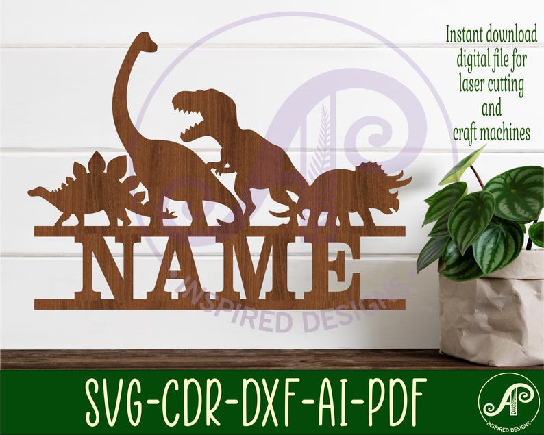 May include: A digital cut file design featuring a silhouette of five dinosaurs with the word "NAME" underneath. The dinosaurs include a stegosaurus, a brachiosaurus, a tyrannosaurus rex, and two triceratops. The design is suitable for laser cutting and crafting.
