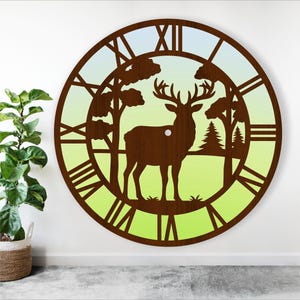 May include: A brown wooden clock with a deer silhouette and forest scene design. The clock face has Roman numerals and a gradient background of blue, green, and yellow.
