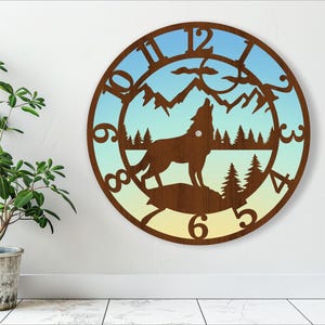 May include: A wooden wall clock with a wolf howling at the moon in a forest scene. The clock face has a gradient background of blue, green, and yellow. The numbers are in a circular pattern around the clock face.