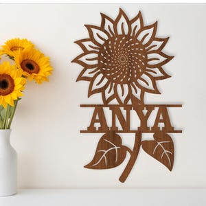 Modelo de placa de nome em formato de girassol SVG cortado a laser, cabide de porta ou parede, arquivo vetorial ai, cdr, dxf pdf download instantâneo
