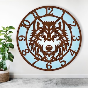 May include: A wooden clock with a wolf design. The clock face is light blue with dark brown numbers. The wolf is brown with a white face and a black nose.