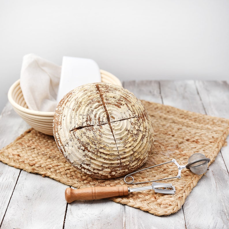 bread placed outside proofing basket with liner folded inside