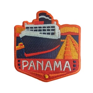 May include: An orange and yellow embroidered patch with a black and white ship and the word "PANAMA" in white text.