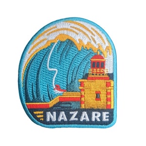 May include: Embroidered patch featuring a lighthouse with a red roof and yellow walls, set against a blue wave with white foam. The text "NAZARE" is embroidered in white below the lighthouse.