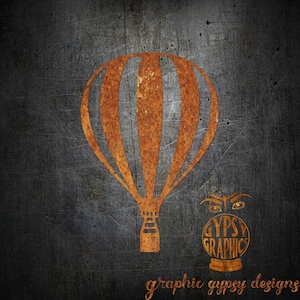May include: A rusty orange hot air balloon graphic with a crystal ball graphic below it that says "Gypsy Graphics" in a rusty orange font. The background is a dark gray textured surface.
