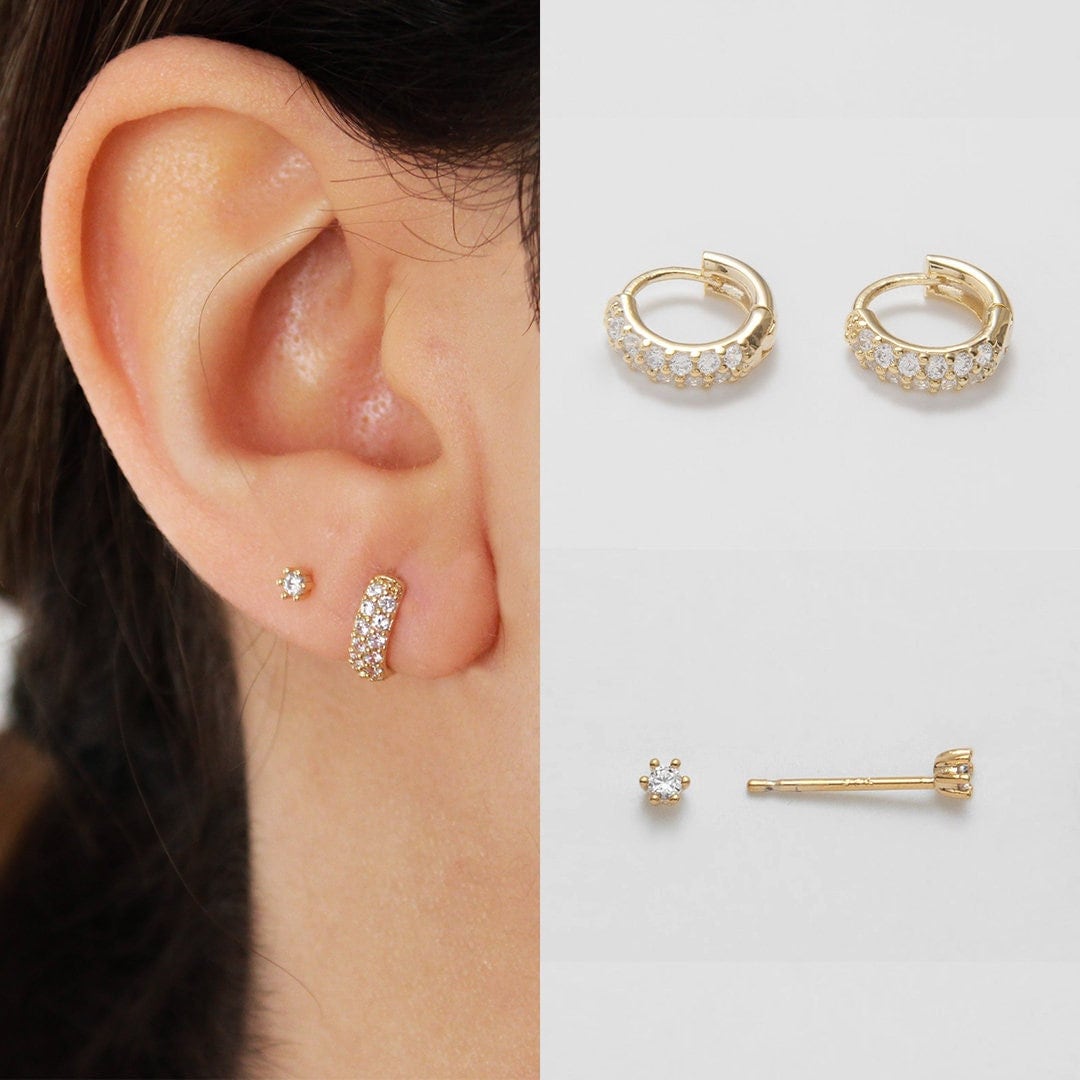Jewelry ideas for two somewhat randomly placed conch piercings? Both are  fully healed (bottom is 10 years old, top is a year old). The hoops in the  bottom are irritating and I