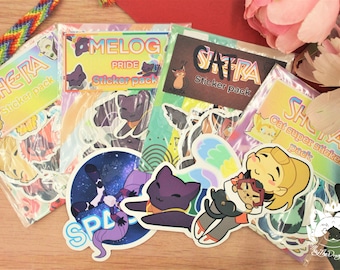 May include: Several sticker packs with cartoon illustrations and text including "SHE-RA", "MELOG PRIDE", and "SATRA". The stickers feature various characters and designs. A rainbow friendship bracelet is visible in the background.