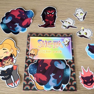 May include: A sticker pack featuring characters from the animated series She-Ra and the Princesses of Power. The pack includes stickers of Adora, Catra, Glimmer, and other characters. The stickers are printed on high-quality vinyl and are perfect for decorating laptops, water bottles, and other surfaces.